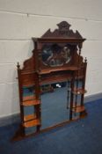 AN EDWARDIAN WALNUT OVERMANTEL MIRROR, width 89cm x height 128cm