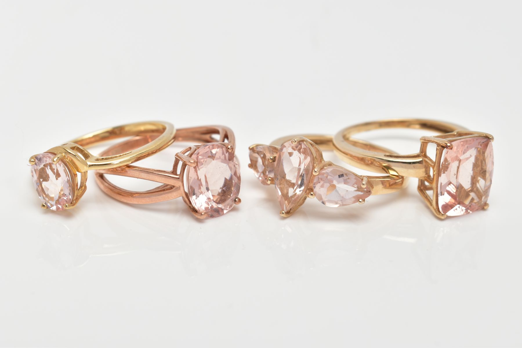 FOUR 9CT GOLD MORGANITE SET DRESS RINGS, each of various designs, set with vary cut morganite, one - Image 2 of 3