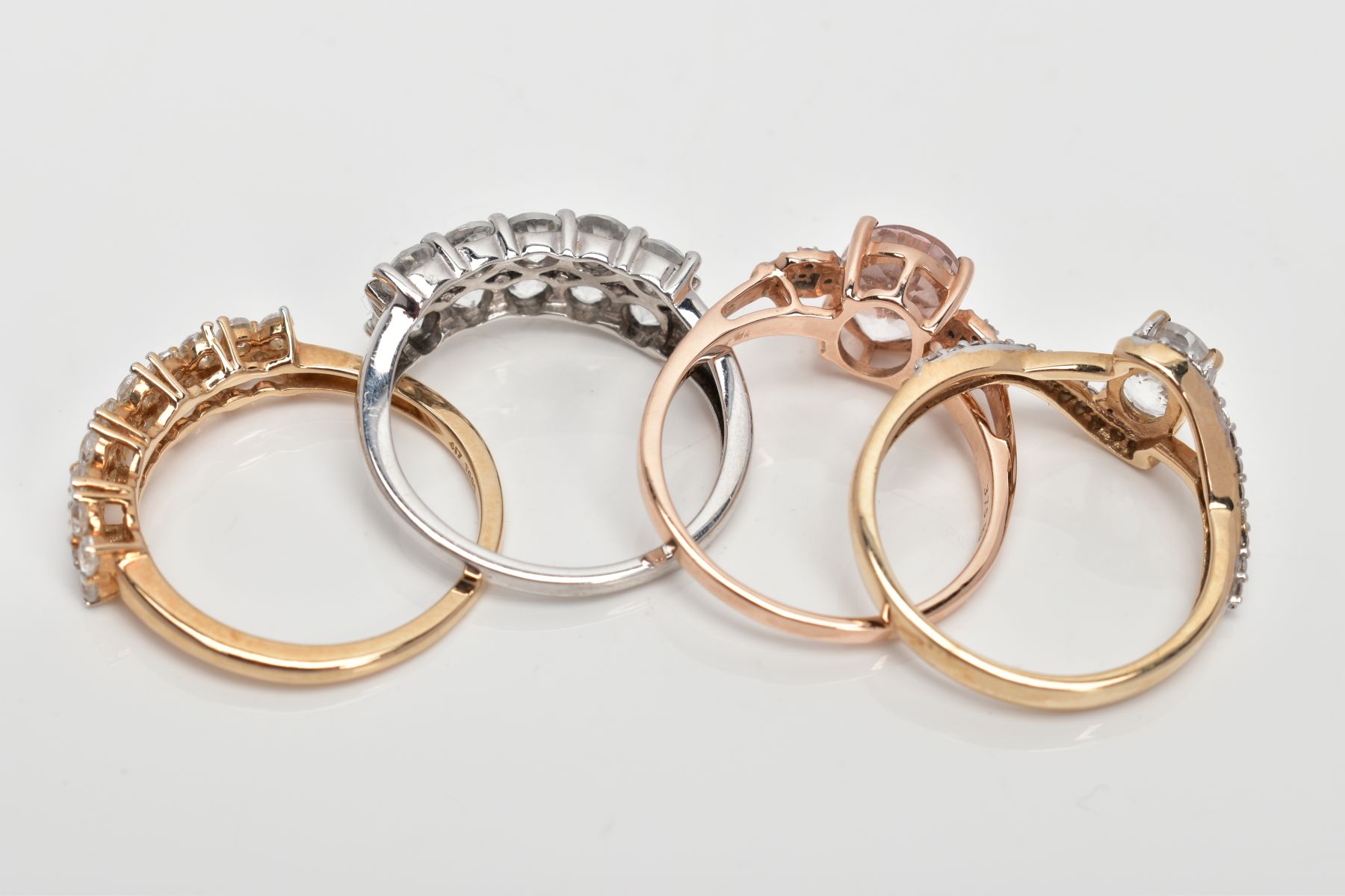 FOUR 9CT GOLD DRESS RINGS, the first a rose gold ring set with an oval cut morganite, flanked with - Image 3 of 3