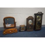 A VICTORIAN FLAME MAHOGANY SWINGING DRESSING MIRROR, along with two wall clocks and an Art Deco