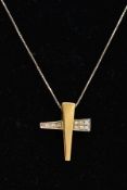 A YELLOW AND WHITE METAL DIAMOND PENDANT NECKLACE, the yellow and white metal pendant of a cross