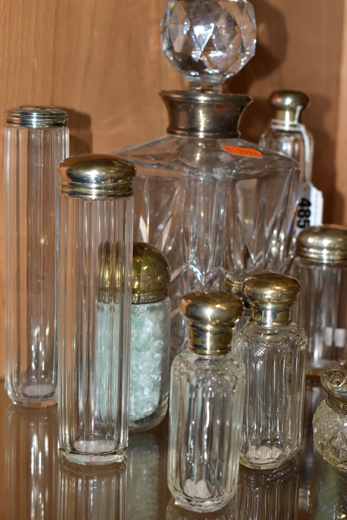 A SQUARE GLASS DECANTER WITH HALLMARKED SILVER COLLAR AND FOURTEEN SILVER TOPPED GLASS TOILET - Image 10 of 12