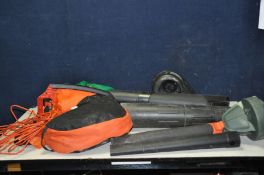 A BLACK AND DECKER GW370 GARDEN BLOWER/VAC with attachments (PAT pass and working ) and a Black