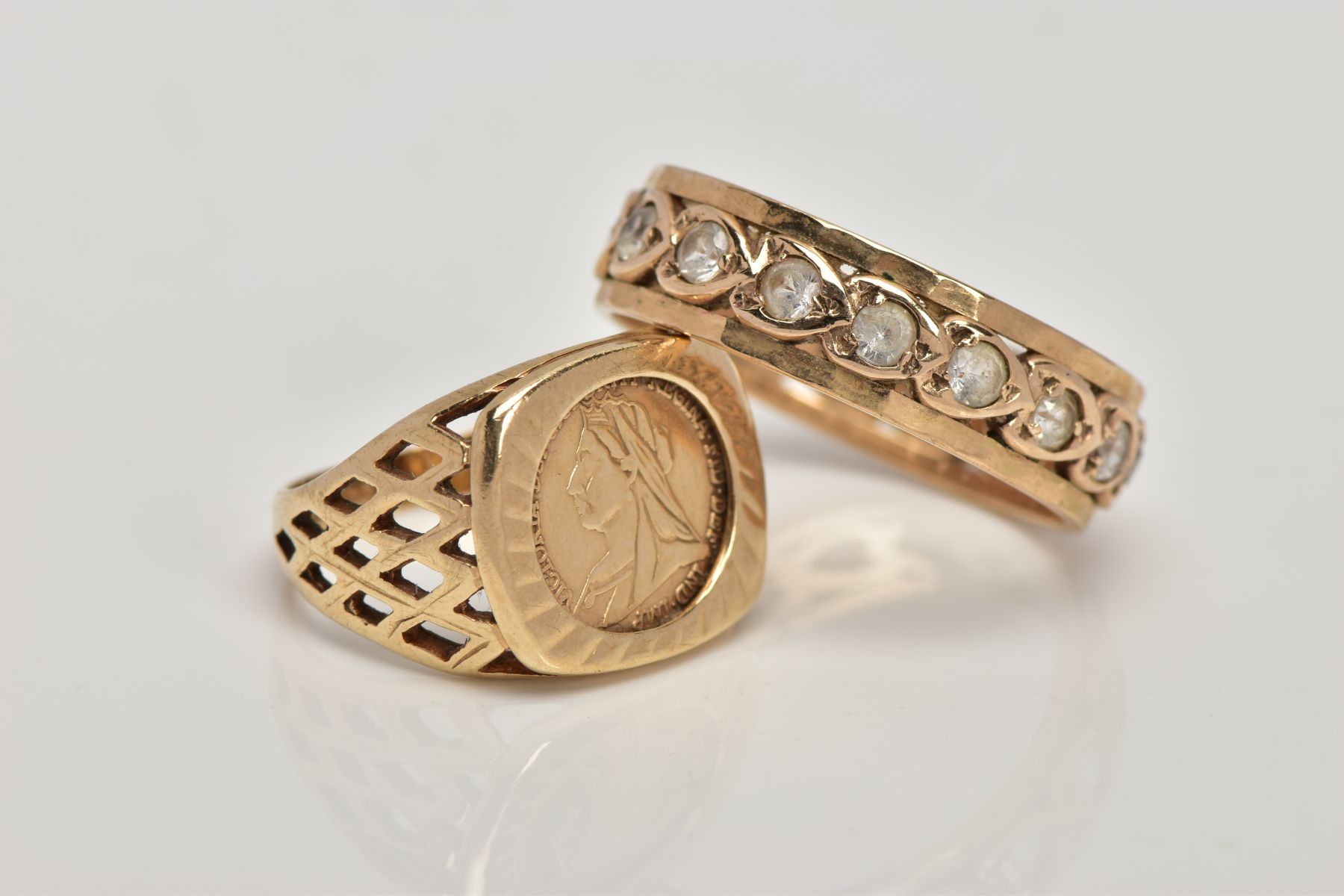 A 9CT GOLD SIGNET RING AND A YELLOW METAL FULL ETERNITY RING, the signet ring set with a small coin, - Image 2 of 3