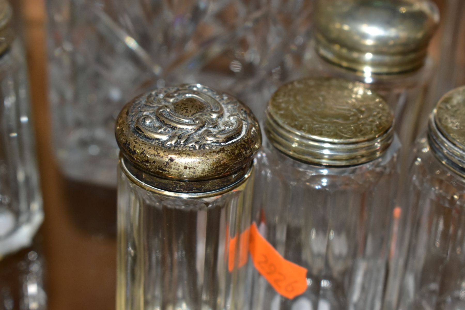A SQUARE GLASS DECANTER WITH HALLMARKED SILVER COLLAR AND FOURTEEN SILVER TOPPED GLASS TOILET - Image 7 of 12