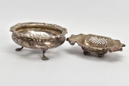 TWO SILVER DISHES, the first of a circular pierced form, decorated with scrolls and flowers,