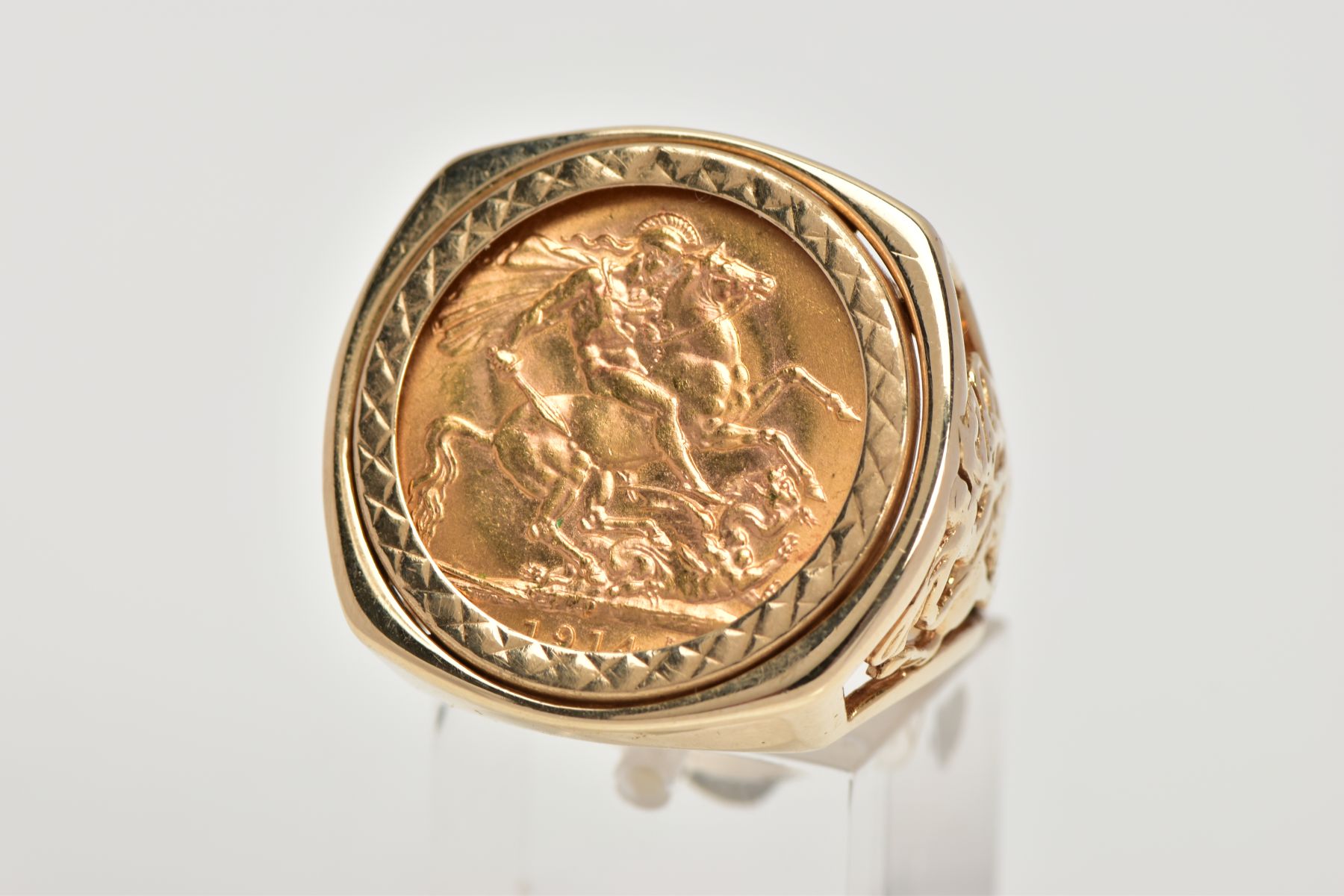 A SOVEREIGN RING, the 1914 George V sovereign within a 9ct gold ring mount with pierced George and