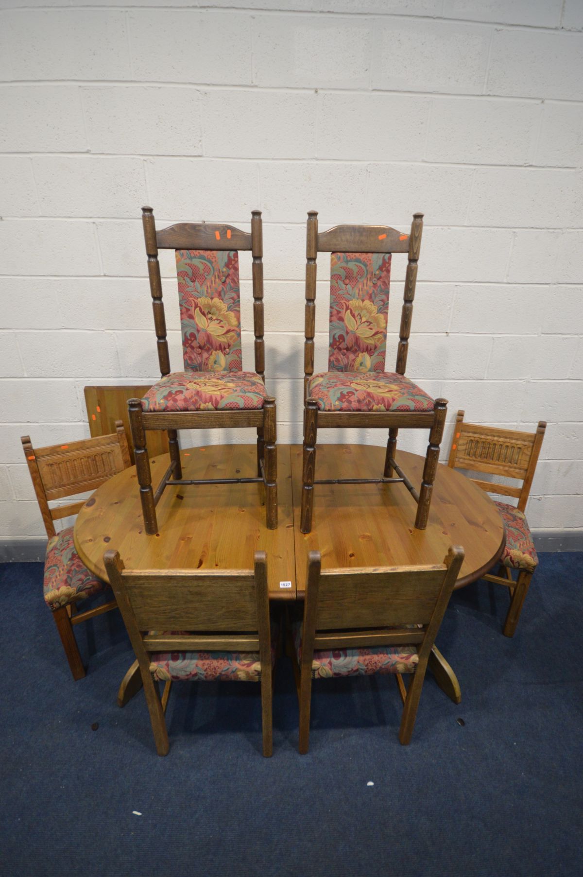 A PINE EXTENDING DINING TABLE, four oak chairs and two other chairs (7)