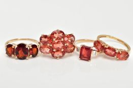 FOUR 9CT GOLD GEM SET RINGS, set with orange and red gemstones possibly Andesine, each with a 9ct