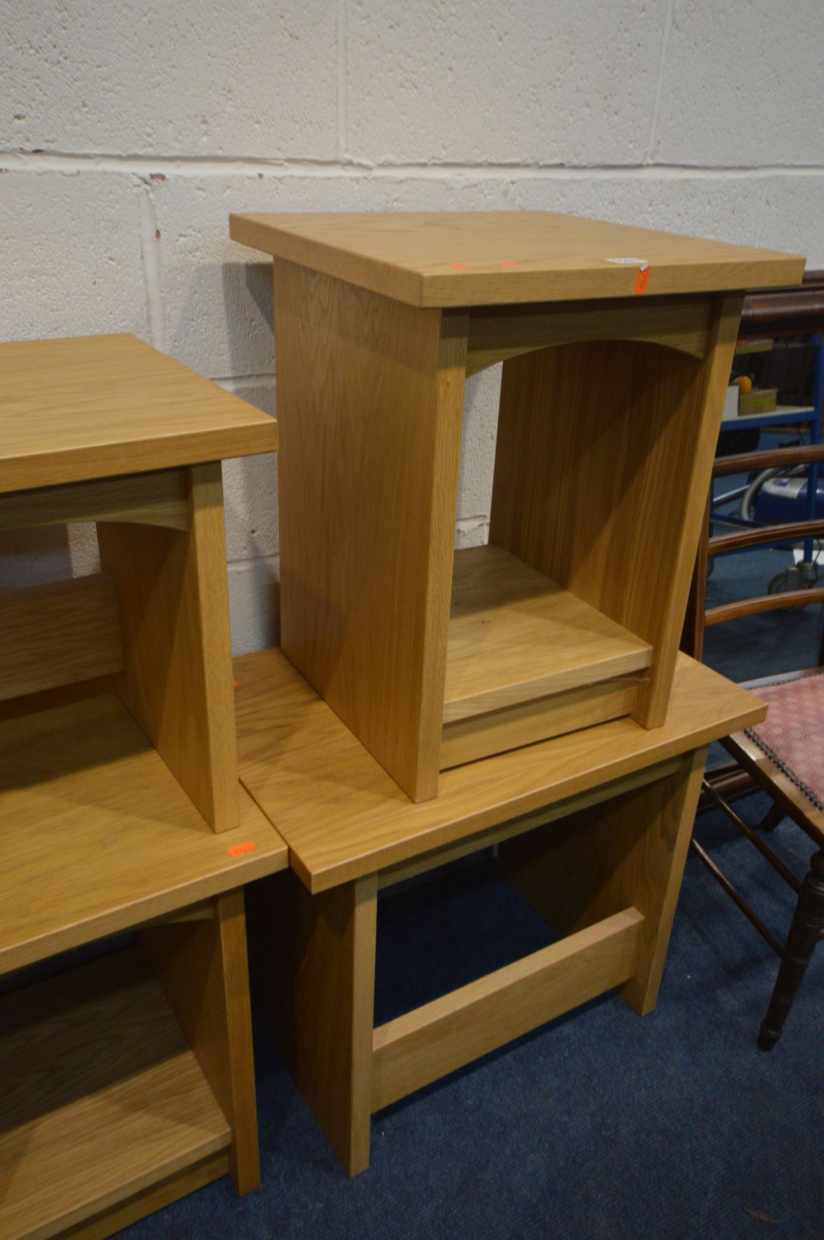 A SET OF FOUR OAK EFFECT OCCASIONAL TABLES, along with a pine bevelled edge mirror and an - Image 2 of 2