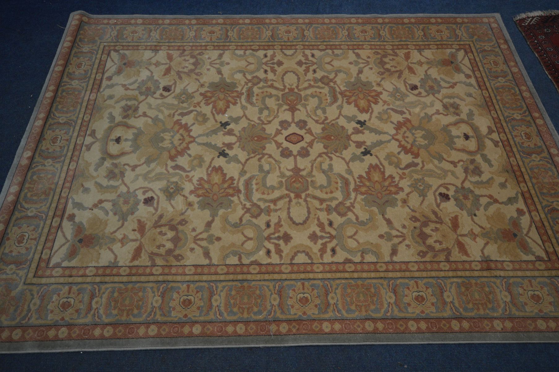 A FLORAL WOOLLEN RUG, labelled Abbey, 240cm x 170cm and two small tekke rugs, in a red field (3) - Image 2 of 4