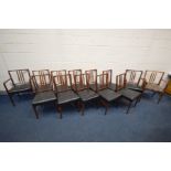 GORDON RUSSELL, MODEL BURFORD, A SET OF THIRTEEN TEAK DINING CHAIRS, twelve chairs with black