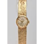 A LADIES 9CT GOLD 'ROLEX' WRISTWATCH, round champagne dial signed 'Rolex, precision', baton