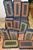 TWENTY FIVE TAPESTRY COVERED HASSOCKS (CHURCH KNEELERS), blue ground with geometric designs (one