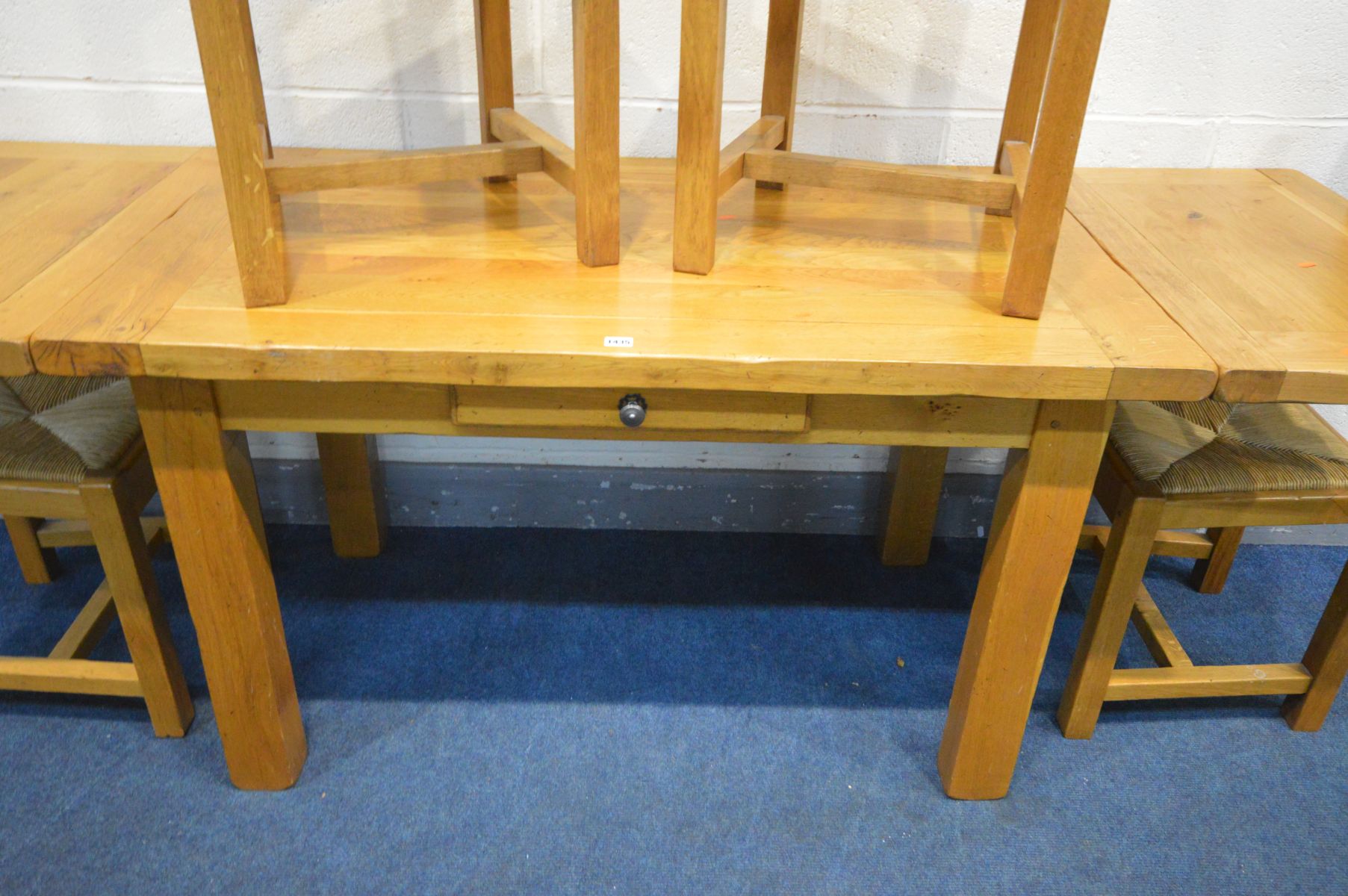 A LIGHT SOLID OAK DINING TABLE, with a single drawer and two extending leaves, extended length 221cm - Image 3 of 3