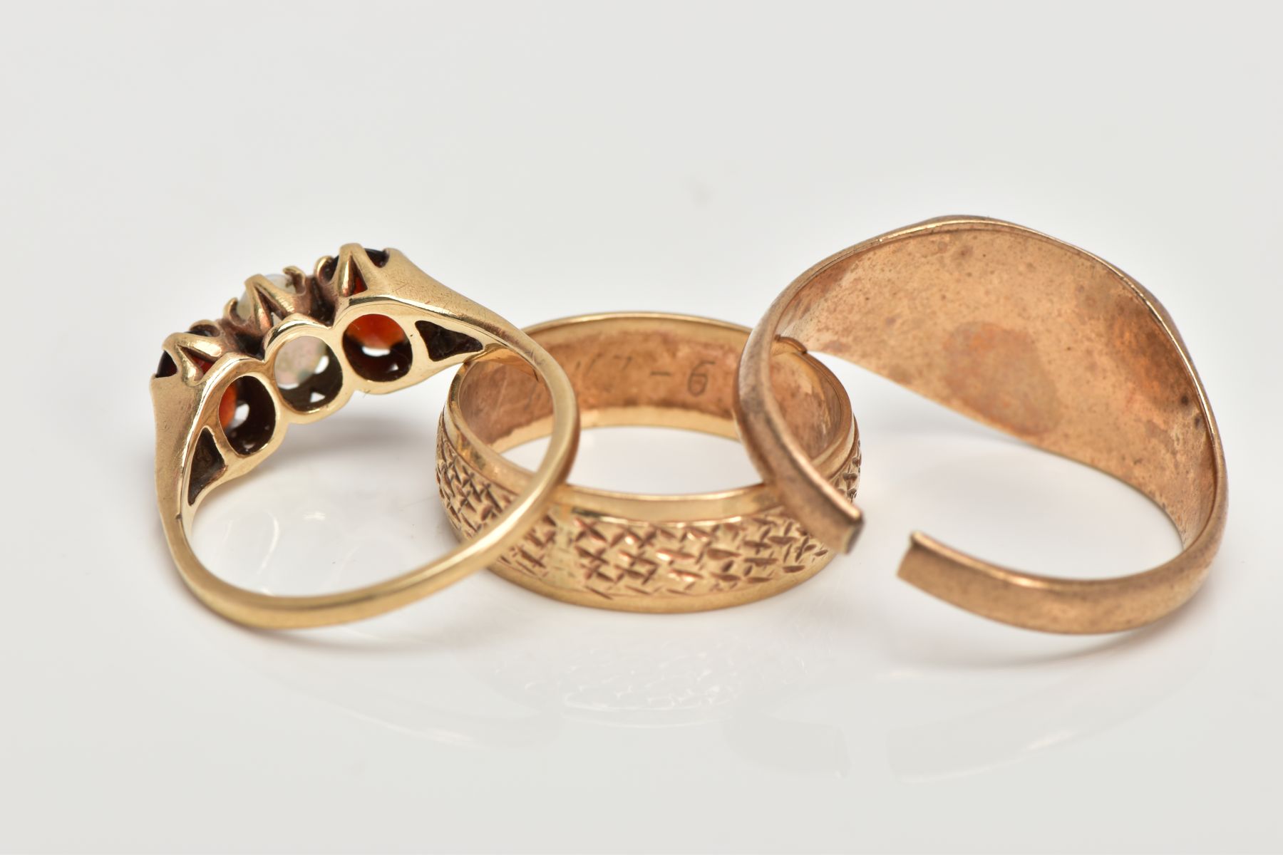 THREE 9CT GOLD RINGS, the first a textured band, hallmarked 9ct gold possibly London, ring size L, - Image 3 of 4