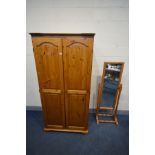 A PINE DOUBLE DOOR WARDROBE, width 93cm x depth 62cm x height 184cm (key) and a pine cheval