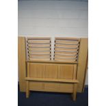 A NATURAL OAK 5FT BEDSTEAD, with two separate drop in slatted base (complete with bolts)