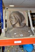 A CONCRETE SCULPTURE OF THE HEAD AND SHOULDERS OF A SLEEPING FEMALE, bronze patination to the