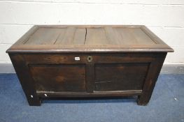 A GEORGIAN OAK PANELLED COFFER, initialled to lid R H, width 118cm x depth 56cm x height 66cm (