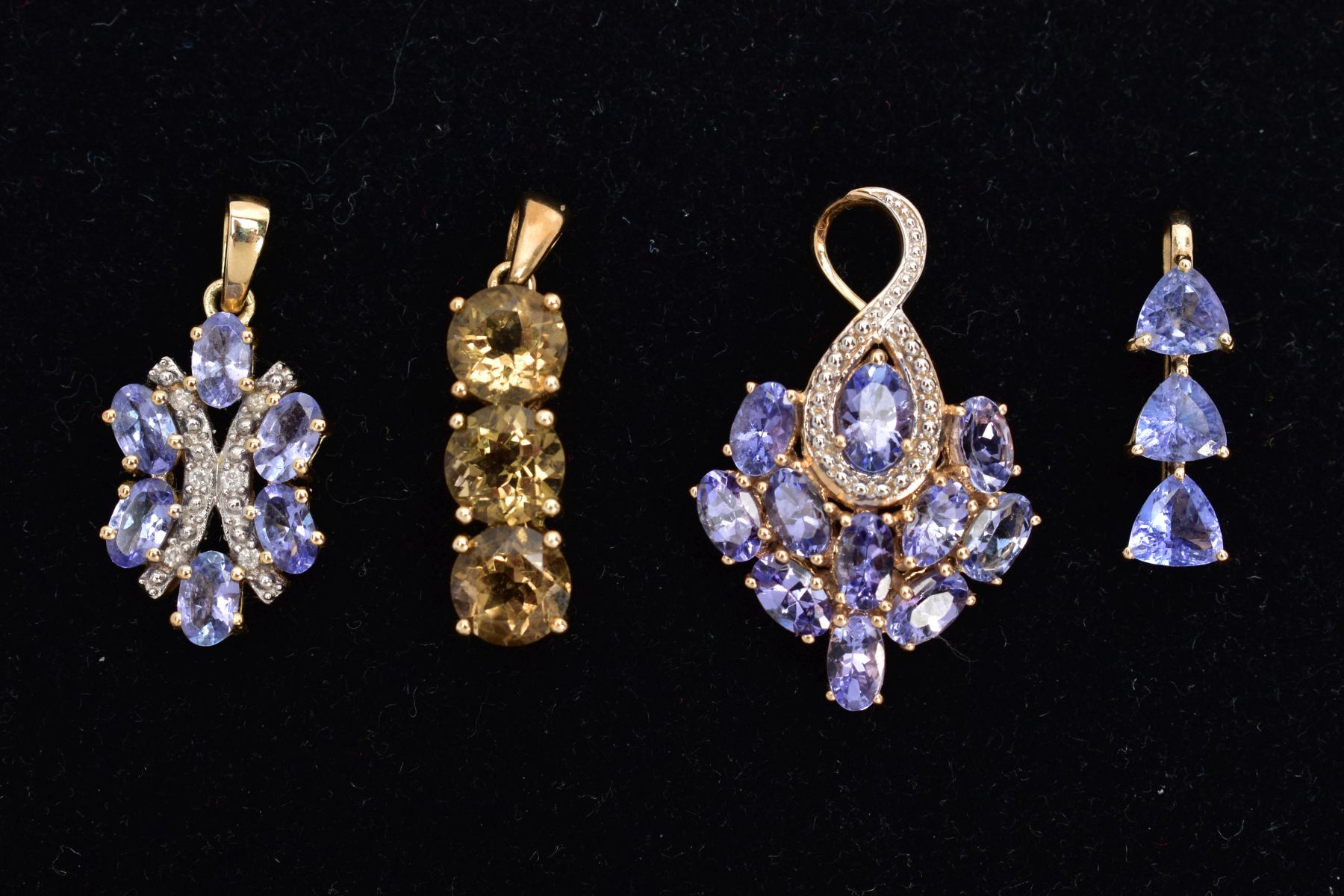 FOUR YELLOW METAL GEM SET PENDANTS, the first set with three circular cut citrines, tapered bail, - Image 2 of 2