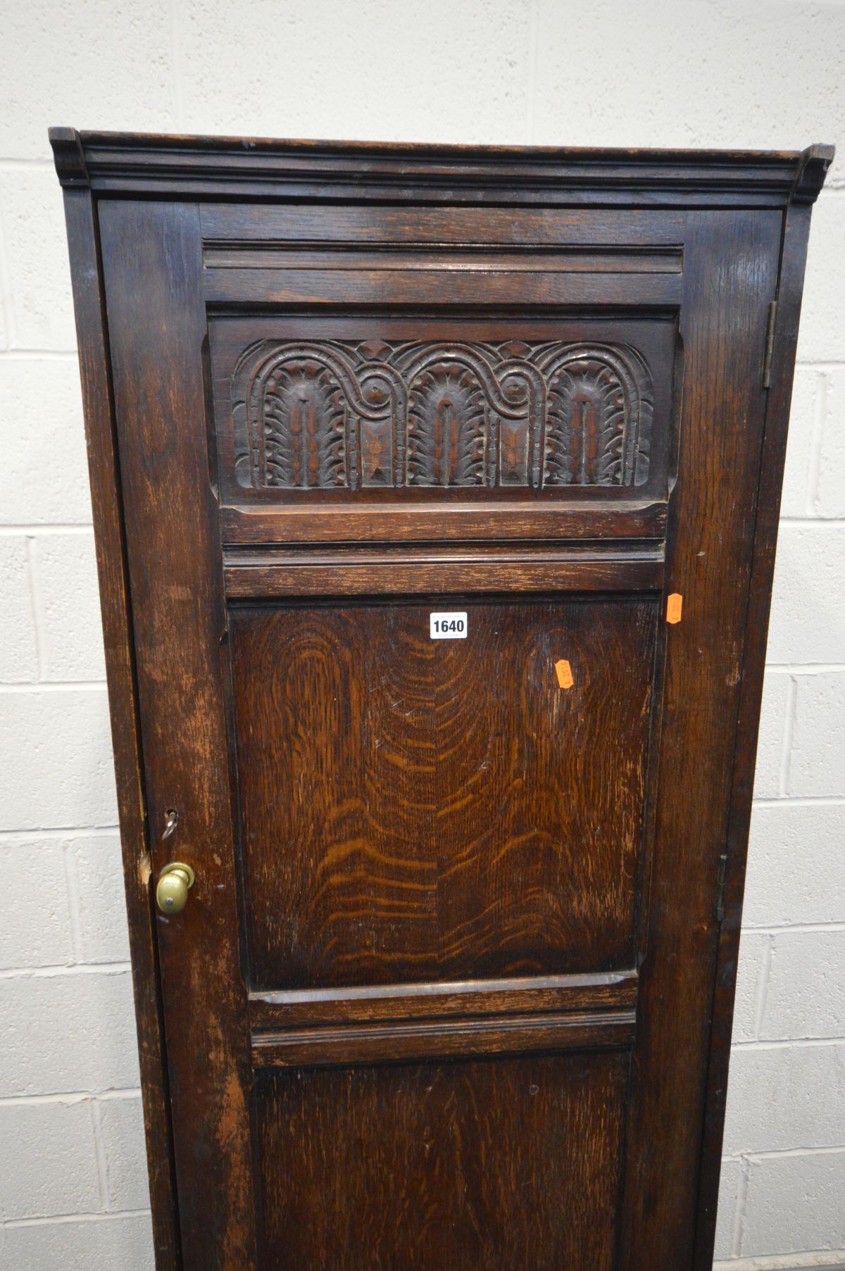 A SLIM 20TH CENTURY PANELLED OAK CUPBOARD, enclosing an arrangement of shelves width 56cm x 50cm x - Image 2 of 3