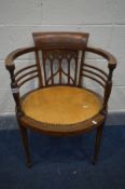 AN EDWARDIAN MAHOGANY AND MARQUETRY INALID TUB CHAIR