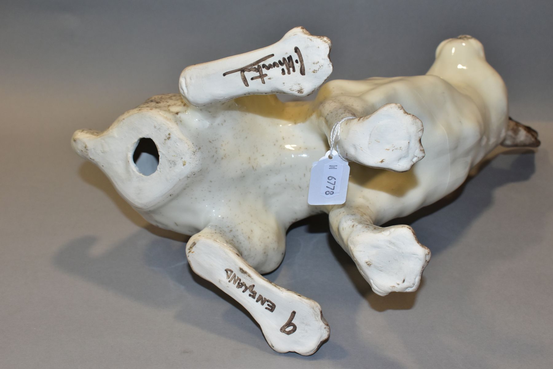 A WINSTANLEY POTTERY CREAM AND MOTTLED BROWN FIGURE OF A SEATED HARE, glass eyes, painted marks to - Image 5 of 5