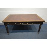 A LATE VICTORIAN OAK WRITING DESK, with a burgundy leatherette inlay top, three frieze drawers and