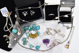 A BAG OF ASSORTED JEWELLERY, to include seven small bags with white metal pendant necklaces, a