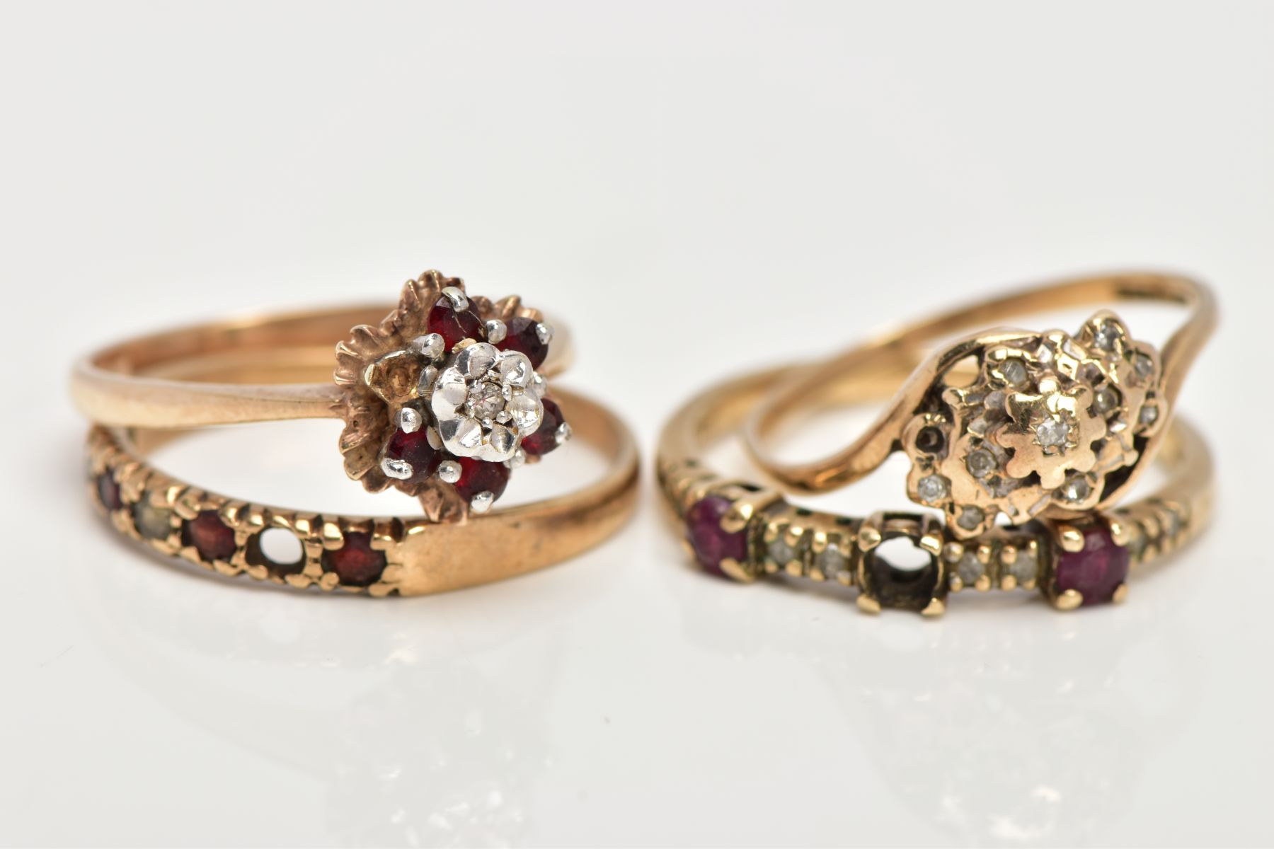 FOUR GEM SET RINGS, to include a cross over diamond cluster ring and a ruby and diamond cluster - Image 2 of 3