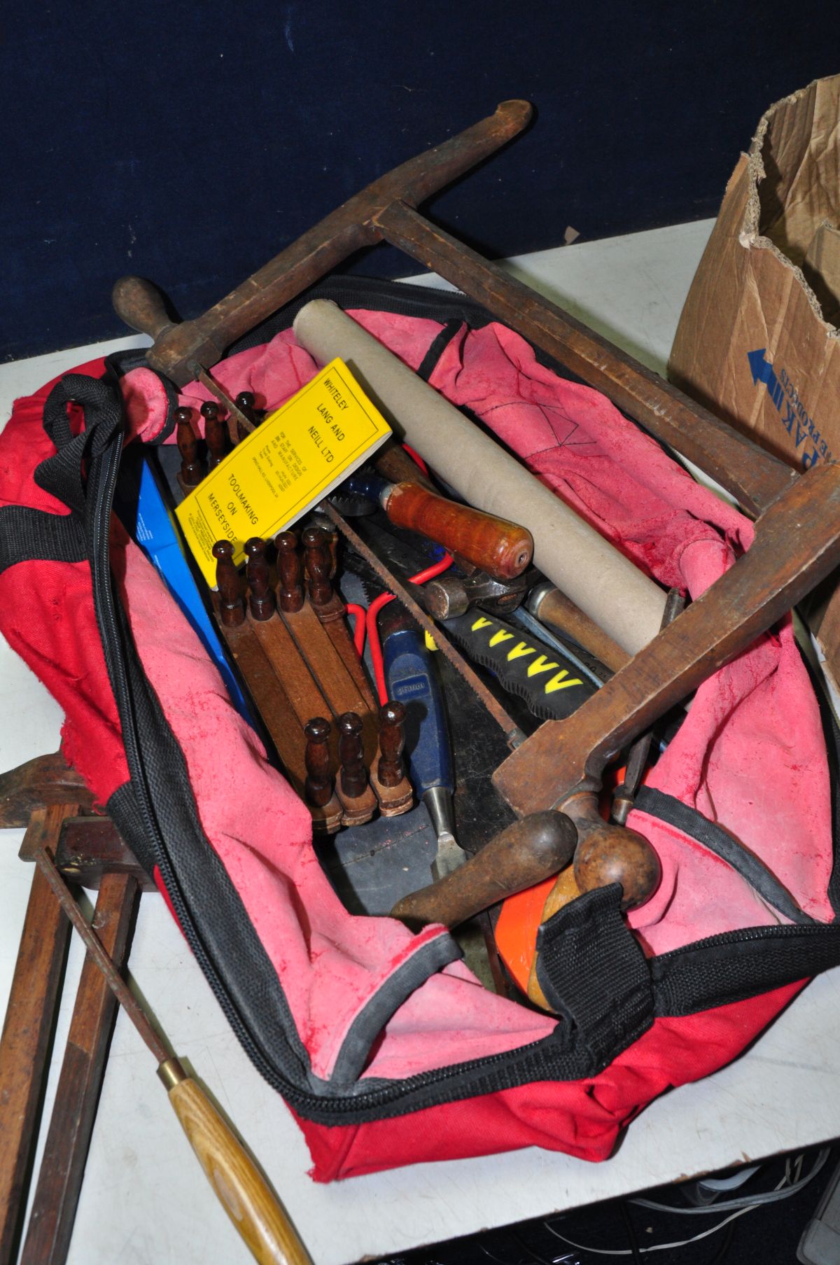 TWO BAGS AND A BAG CONTAINING VINTAGE TOOLS including wooden moulding and plough planes, a bow - Image 3 of 4