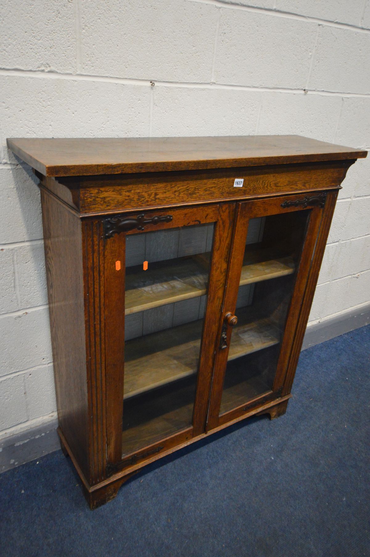 AN ARTS AND CRAFTS OAK BOOKCASE, oversized top, double glazed door enclosing two shelves, width - Image 2 of 3