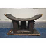 AN AFRICAN ASHANTI STOOL, length 45cm (condition:- work finish in places)