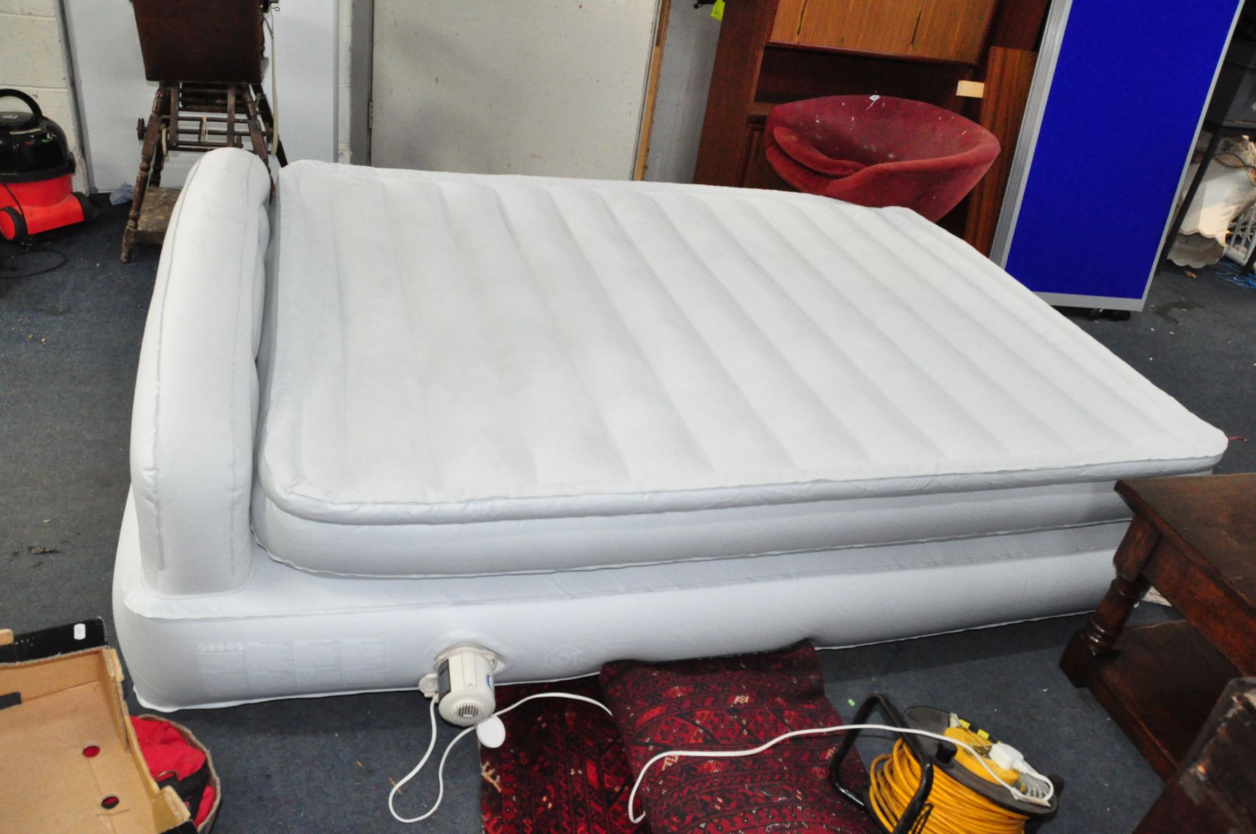 AN AEROBED INFLATABLE BED, 5ft wide with pump and bag (PAT pass and working), a pair of Sovereign