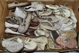 A COLLECTION OF VINTAGE BABIES AND CHILDRENS SHOES, majority are leather and in worn condition,