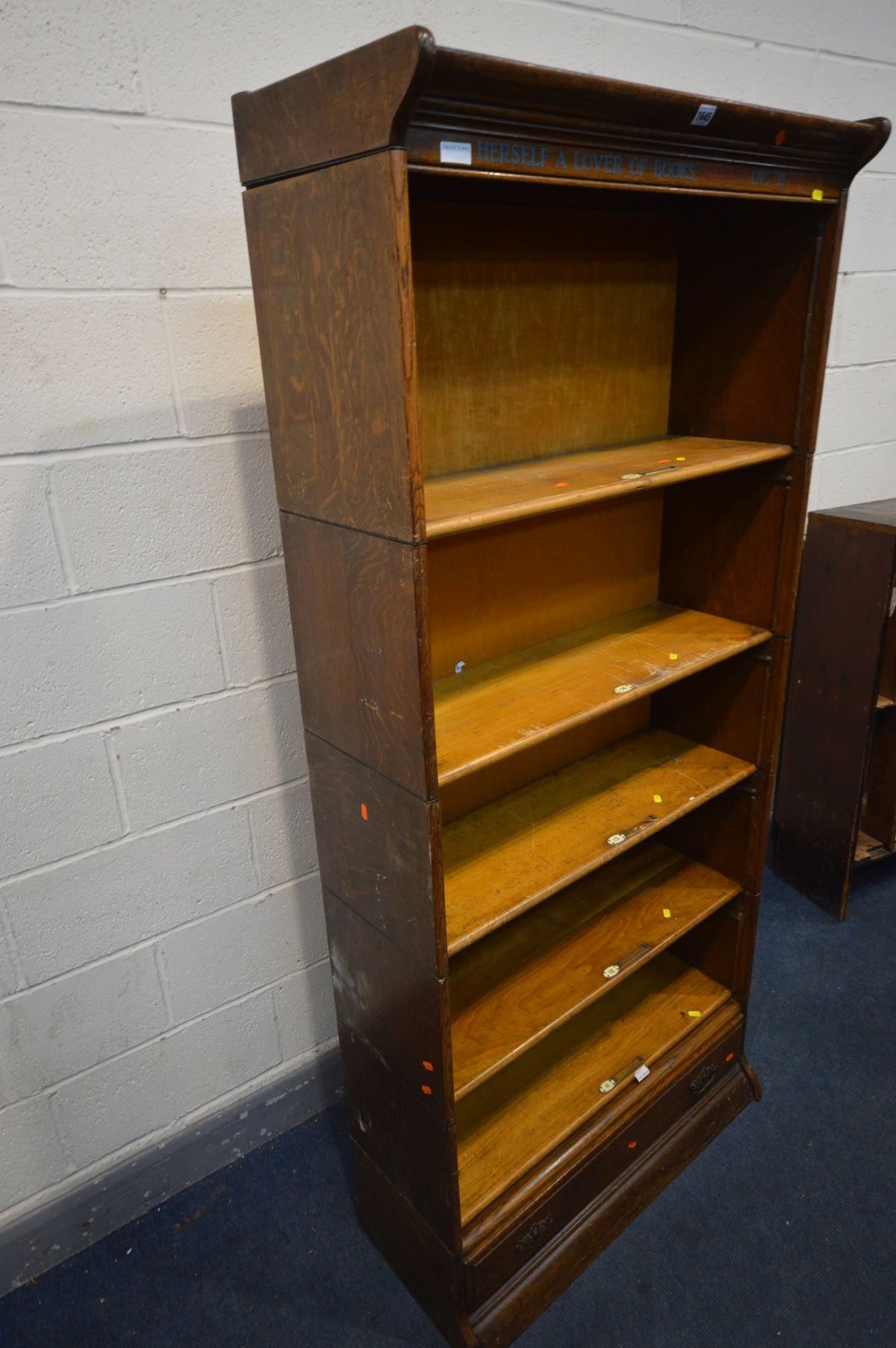 AN OAK FIVE SECTION BOOKCASE, with stencilled writing to top frieze, the bottom section with a - Image 3 of 3