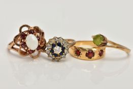 FOUR 9CT GOLD GEM SET RINGS, to include a sapphire and cubic zirconia cluster ring, a cross over