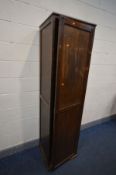 A TALL STAINED PITCH PINE AND PLYWOOD SLIM CUPBOARD, width 54cm x depth 49cm x height 197cm (one