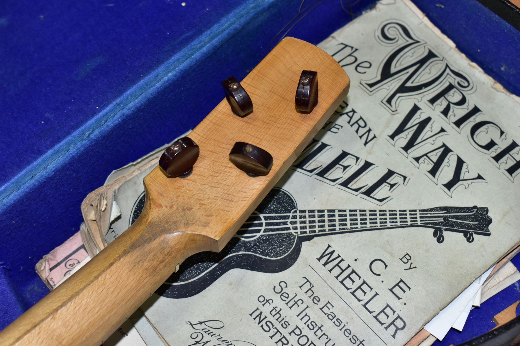 A RELIANCE UKELELE-BANJO IN A CARRY CASE, comes with a small quantity of sheet music - Image 4 of 6