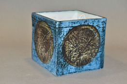 A TROIKA POTTERY SQUARE SHAPED VASE DECORATED BY SYLVIA VALANCE, textured blue/black ground, the