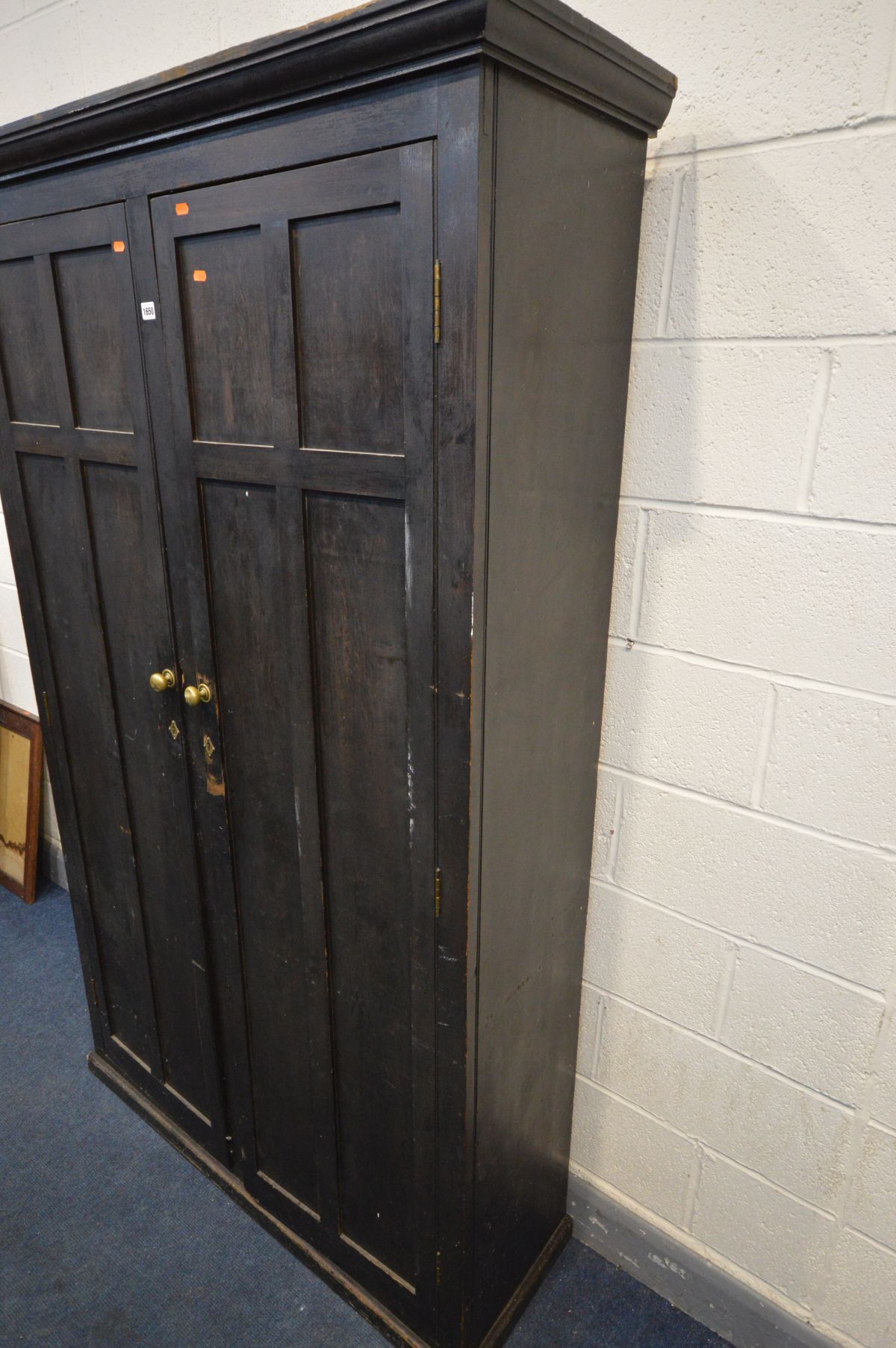 AN EARLY 20TH CENTURY STAINED PINE CUPBOARD, with double panelled doors enclosing ten divisions, - Image 3 of 3