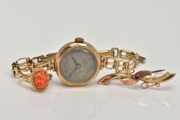 A LADY’S 9CT GOLD WRISTWATCH, A 9CT GOLD RING AND BROOCH, the watch with a hand wound movement,