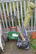 A COLLECTION OF GARDEN TOOLS including a Scotts lawn seeder, a rotary clothes line, etc