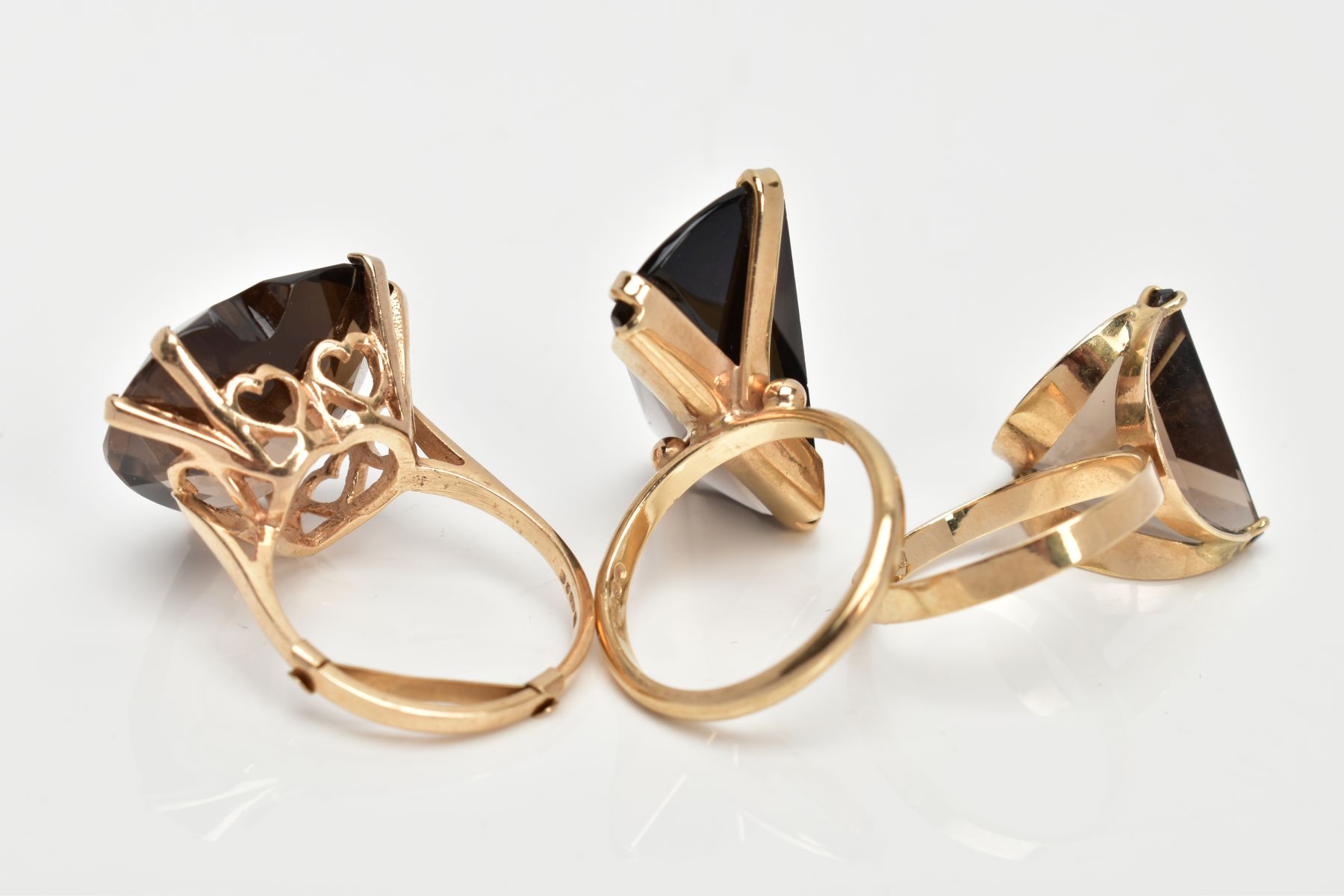 THREE 9CT GOLD SMOKEY QUARTZ DRESS RINGS, the first designed with a heart shaped Smokey quartz, - Image 3 of 3