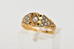 A MID VICTORIAN, 18CT GOLD SPLIT PEARL RING, the centre set with a single split pearl, scroll detail