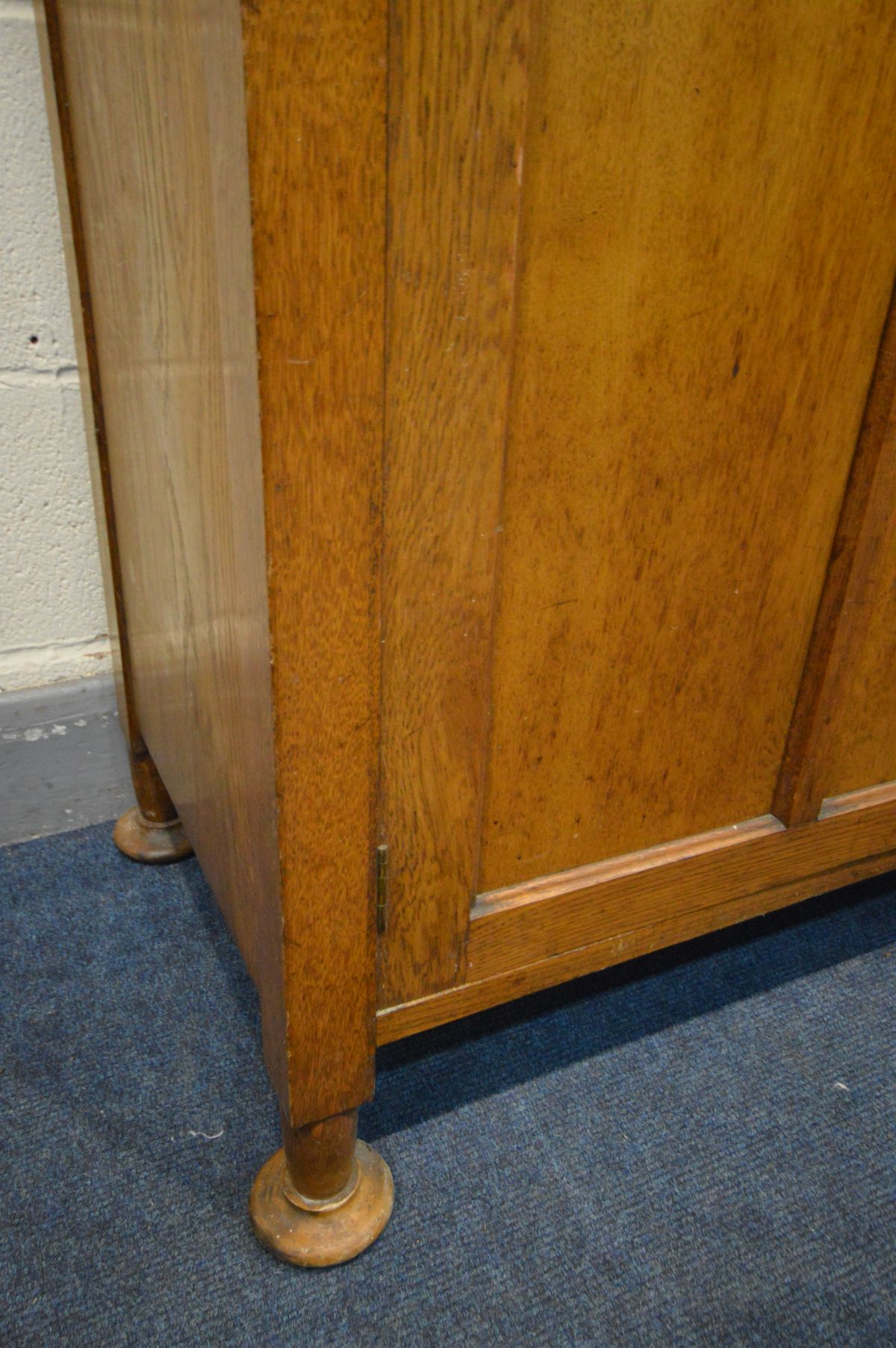 AN EARLY 20TH CENTURY ARTS AND CRAFTS OAK TWO DOOR LEAD GLAZED BOOKCASE, with two drawers, over - Image 4 of 5