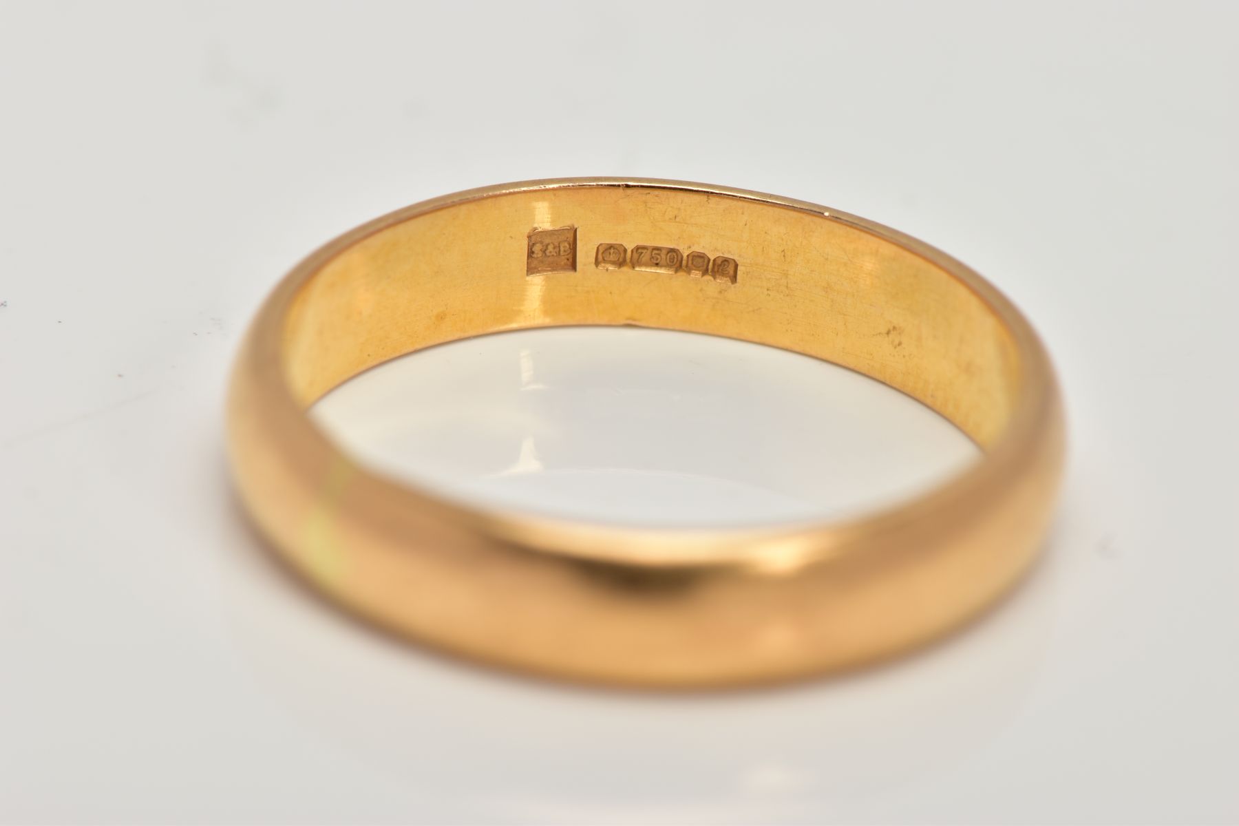 AN 18CT GOLD WEDDING BAND, of a plain polished design, hallmarked 18ct gold London, ring size Q, - Image 2 of 2