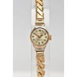 A 9CT GOLD EXCALIBUR LADY'S WRISTWATCH, fitted to a rolled gold expanding bracelet, case measuring