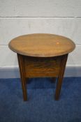 AN OAK OVAL TOPPED SEWING CABINET, with a single shelf, and some contents